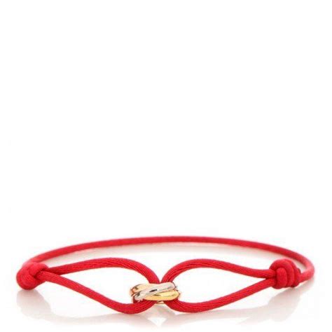 cartier trinity bracelet red ribbon.